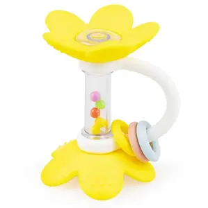 GiliGums Silikonové kousátko, chrastítko Květina, žluté