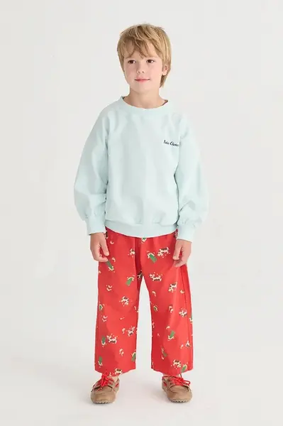 Dětské bavlněné kalhoty Bobo Choses Farm Adventure