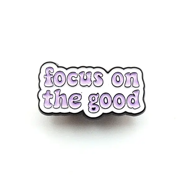 Focus on The Good Word Enamel Pin