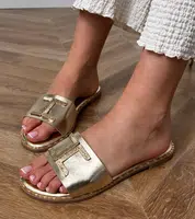 D/CEO Golden flip-flops with a golden ornament on the strap Verona
