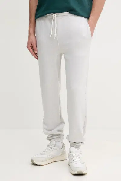 Tepláky Tommy Hilfiger pánské, šedá barva, melanžové, UM0UM03513
