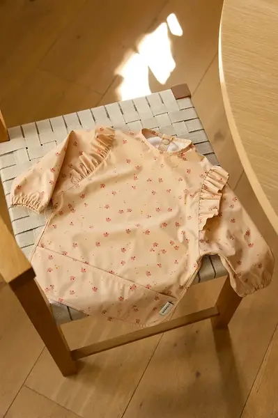 Dětský bryndáček Liewood Merle Ruffle Cape Bib