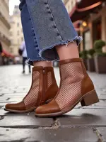 Resti Women's perforated ankle boots on a low heel Rowices