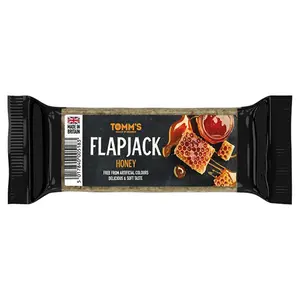 TOMMS Flapjack ovesná tyčinka honey 100 g