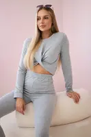 Set with ruffles on a gray blouse