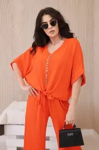 Set of blouses with orange trousers