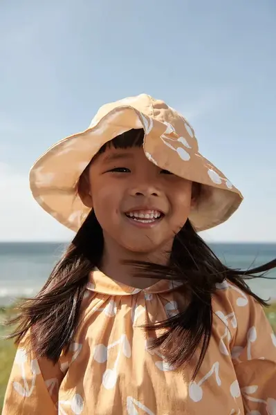 Liewood Detský obojstranný klobúk Liewood Amelia Reversible Sun Hat