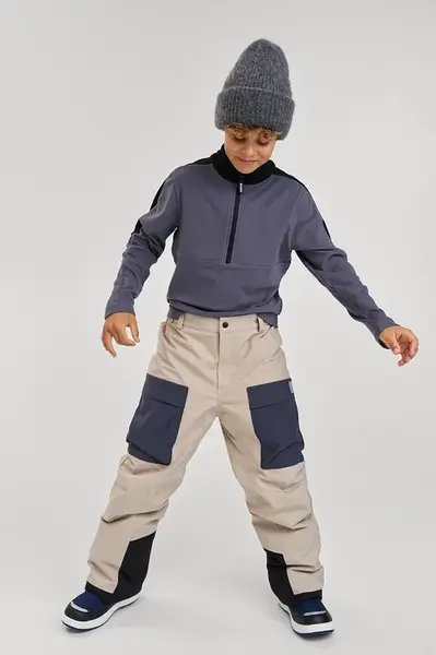 Dětské zimní sportovní kalhoty Reima Viekkala béžová barva, 5100395A