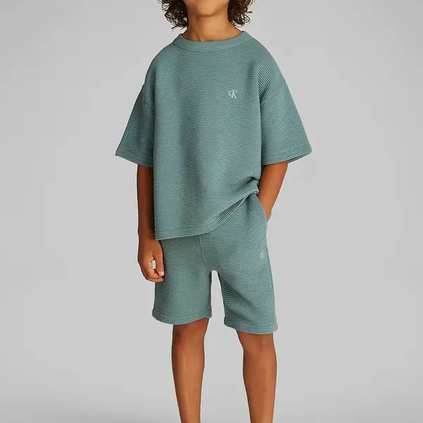 Dětská souprava Calvin Klein Jeans zelená barva, IB0IB02503