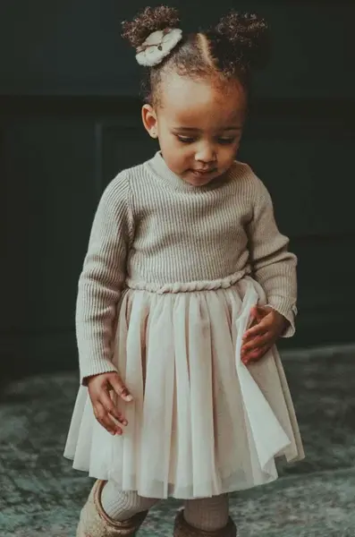 Kojenecké šaty Donsje Lotus Dress