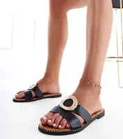 Gemre Black sandals with a gold embellishment and cutouts on the strap Satima