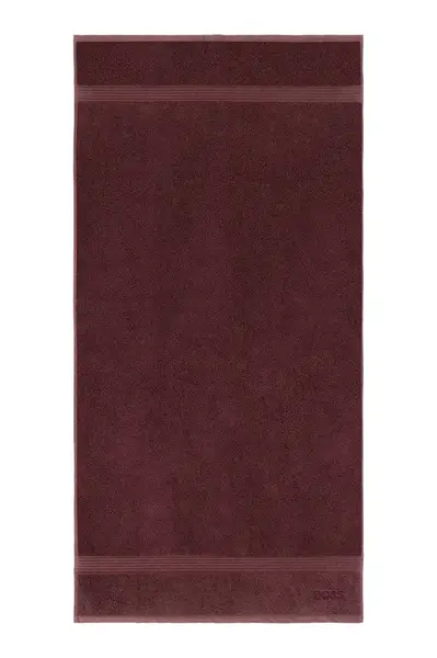 Bavlněný ručník BOSS LOFT Brownie 70 x 140 cm vínová barva