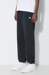 Tepláky New Balance Essentials French Terry Jogger