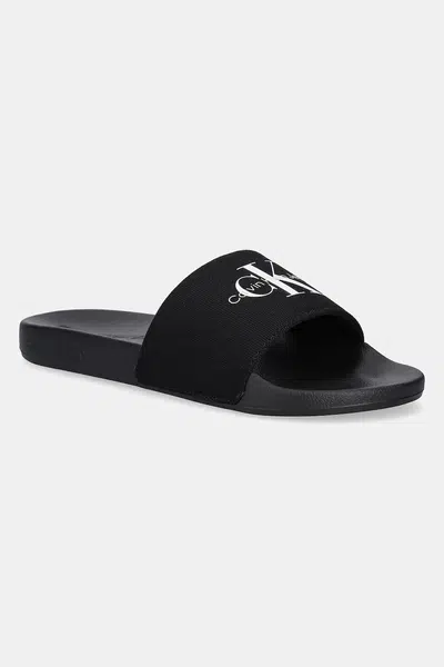 Pantofle Calvin Klein Jeans SLIDE MONOGRAM pánské, černá barva, YM0YM01271