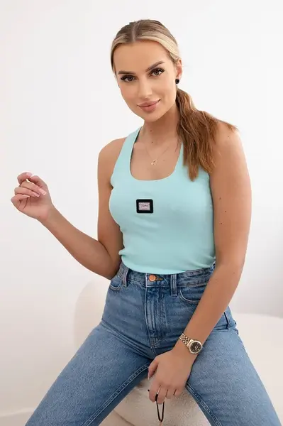 Pruhovaná halenka s kovovým plátem máty