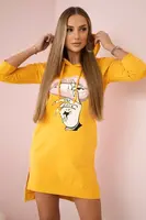 Dress with a longer back and a colorful mustard print