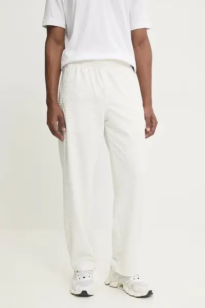 Tepláky adidas Originals Q12 MONOGRAM TR