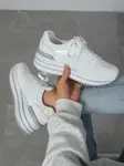 Resti Women's sports sneakers on a platform Revided