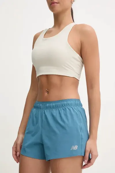 Běžecké šortky New Balance zelená barva, medium waist, WS41286TEI
