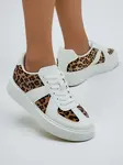 Resti Women's sporty sneakers with leopard print Big Cat