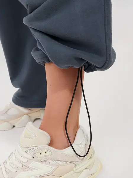 Dámské tepláky v grafitové barvě