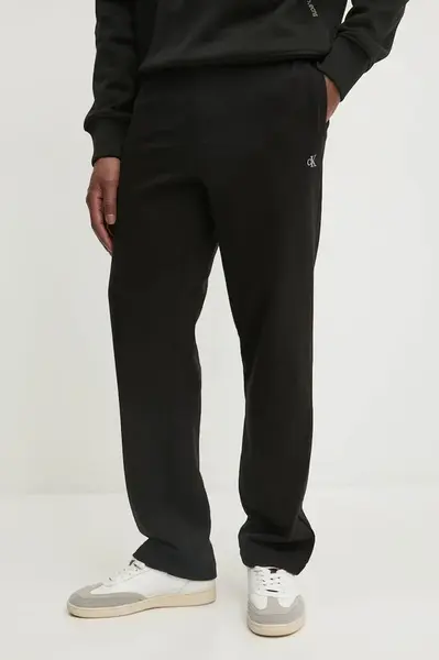 Bavlněné tepláky Calvin Klein Jeans černá barva, J30J326749