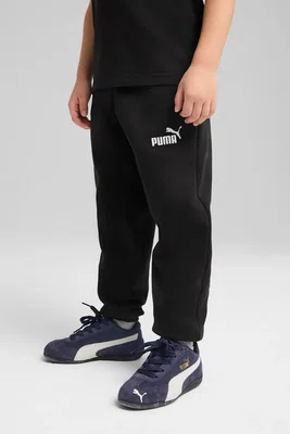 Dětské tepláky Puma ESS No. 1 Logo Sweatpants FL PS černá barva, s potiskem, 684933