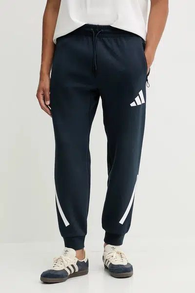 Tepláky adidas x Z.N.E pánské, modrá barva, JW4723