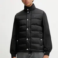 Péřová vesta Tommy Jeans černá barva, zimní, DM0DM21777