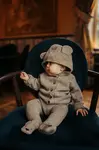 Vlnený detský kardigan Donsje Brittan Merino Wool Cardigan Bear
