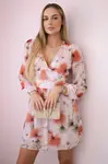 Airy dress with a floral motif in powder pink