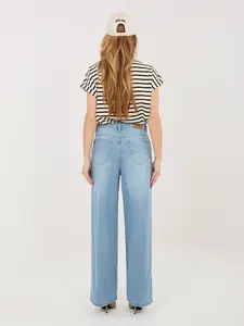 Modré široké džíny s vázáním