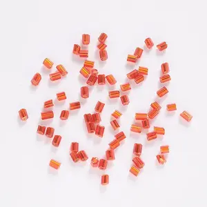 Two Cut Glass Seed Beads