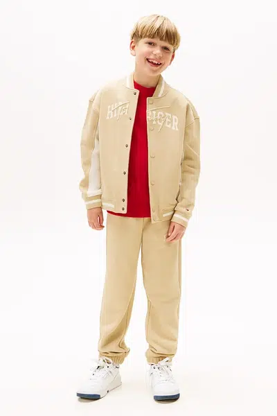 Tepláky Tommy Hilfiger hnědá barva, KB0KB09695