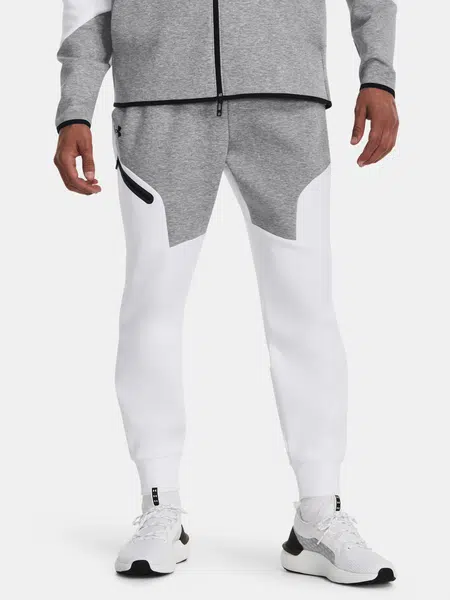 Šedo-biele športové tepláky Under Armour UA Unstoppable Flc Joggers
