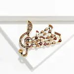 Alloy and Glass Rhinestone Musical Note Brooch