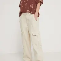 Bavlněné kalhoty Vans béžová barva, jednoduché, high waist