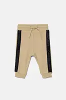 Kojenecké bavlněné tepláky Calvin Klein Jeans