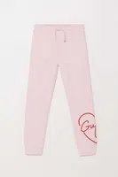 Dětské bavlněné tepláky Guess růžová barva, s aplikací, J4YQ16 KA6R3