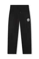 Dětské tepláky Dkny černá barva, hladké, D60226