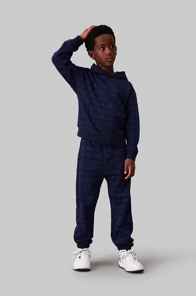 Dětské bavlněné tepláky Calvin Klein Jeans AOP JOGGER