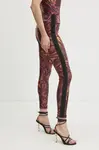 Legíny Versace Jeans Couture dámské, oranžová barva, vzorované, 78HAC114 JS438