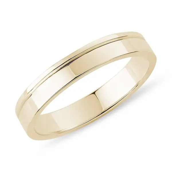 Pánský snubní prsten s drážkou ve žlutém zlatě KLENOTA