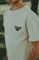 Bavlněné dětské tričko Donsje Jarne T-shirt Koala béžová barva, 4081802