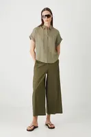 Lněné kalhoty Medicine zelená barva, střih culottes, medium waist