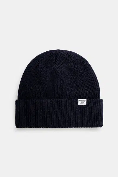 Vlněná čepice Norse Projects Czapka Norse Projects Norse Beanie N95-0569 7004 tmavomodrá barva
