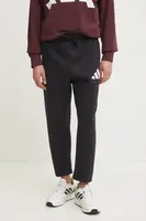 Tepláky adidas Future Icons černá barva, hladké, JD4910