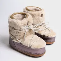 Capone Outfitters Women's Round Toe Platinum Thick Soled Shearling Boots