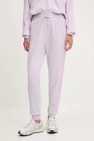 Tepláky adidas Essentials dámské, fialová barva, JE1189