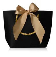Troli Černá dárková taška se zlatou stuhou S